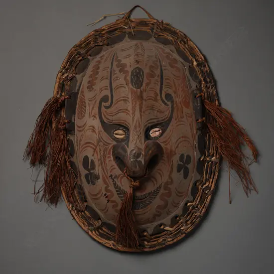Papua New Guinean straw/clay/wood mask,